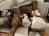a pile of boxes and bags of food on the floor