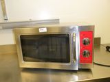 a microwave sitting on a counter in a kitchen