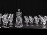 black and white photograph of a set of wine glasses and a decanter