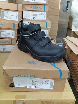 a pair of shoes that are on top of a box