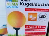 a box of solar powered lights on display in a store
