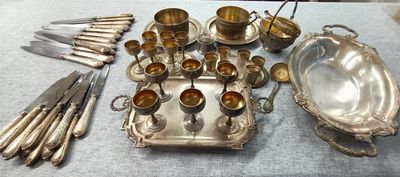 a table with silverware and silverware on it