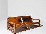 an image of a wooden bench in a white room