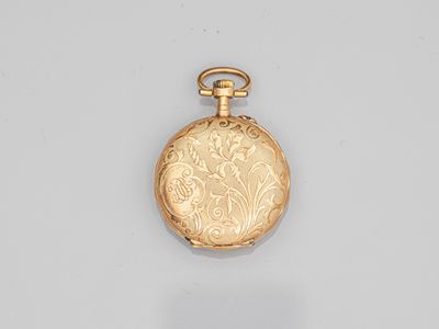 an image of a gold pocket watch with a chain on a white surface