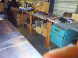 an image of a workbench in a garage with tools on it
