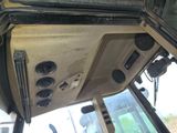 a view of the inside of a vehicle with the door open