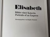 an open book with a black and white title on it