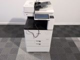 a white printer sitting on top of a black and white printer