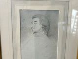 framed drawing of a man in a white shirt