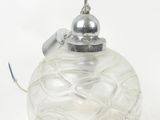 an image of a clear glass ornament with a silver lid