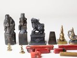 a lot of different types of figurines on a white surface