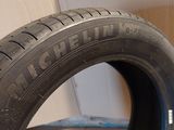 a close up of a tire on a cardboard box with a box in the background