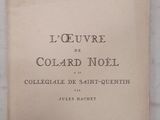 un livre posé sur une table en marbre, avec une photo en noir et blanc