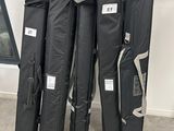 four black cases sitting next to each other on the floor