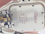 a close up of a person holding a wrist watch