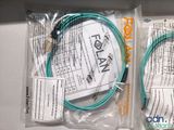 two cables that are in the package on the table
