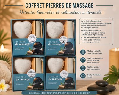 trois boîtes de produits de massage posées sur une table en bois