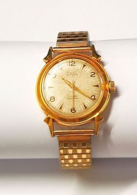 DIFOR MONTRE D'HOMME en plaqué or, cadran rond à décor rayon…