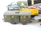 a toy train on a table with other toy trains