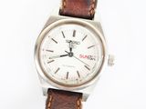 an image of a close up of a wrist watch on a white surface