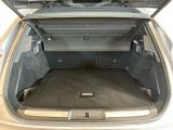 the back of a car with the trunk open and the luggage in the trunk