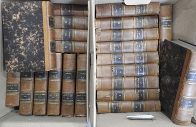 a lot of books that are sitting in a box