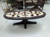a table that has a mosaic design on it