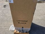the box is sitting on top of a pallet in the parking lot