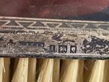 a brush that has been used to clean the brush