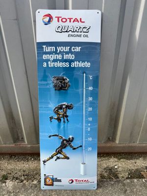 a close up of a sign on the side of a building