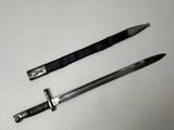 two knives that are laying next to each other on a table