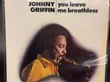 a cd with a picture of a man playing a saxophone