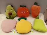 a lot of stuffed fruits and vegetables on the table