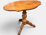 an old wooden table with a wooden top on a white background