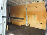 the inside of a van with the door open showing the inside of the van