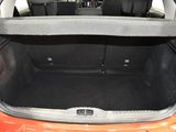 a trunk of a car with the back seats folded down