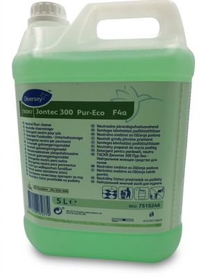 a gallon of green liquid sitting on top of a white surface