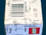 a box of legos sitting on a blue surface