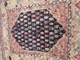 an image of a rug with a diamond design on it