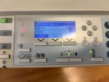 a close up of a remote control on a table