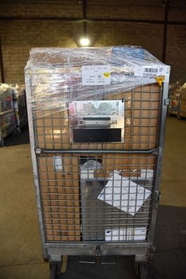 a metal cart with a bunch of boxes on top of it