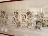 a picture of a wall with a bunch of cartoon faces on it