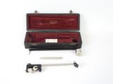 a black case with a knife and other items in it