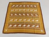 an image of a brown and white scarf with horses on it