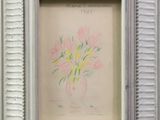 une photo d'une photo représentant des fleurs dans un vase