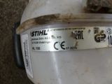 an image of a close up of a toilet with a label on it