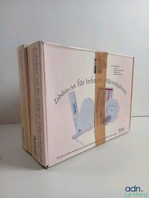 une boîte dans laquelle se trouvent une brosse à dents et une brosse à dents