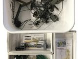 a white container filled with assorted electronic components