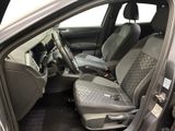 the interior of a car with the front seats up and the passenger seat down