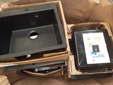 a box with a tablet computer in it and a box with a tablet computer in it